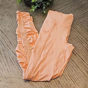 FP movement leggings tangerine size S NWOT